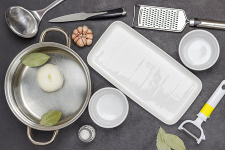 Devices and spices for cooking soup. Black background. Flat layの写真素材