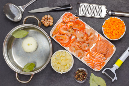 Ingredients and appliances for cooking clam chowder soup. Seafood Natural source of omega-3. Black background. Flat layの写真素材