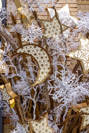 New Year decorations with white snowflakes and golden stars and a half moon. Part of the frame.の写真素材