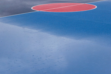 Basketball court field after rain. Abstract background. Part of the frame.の写真素材