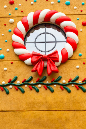 Christmas ornament on yellow wall.の写真素材