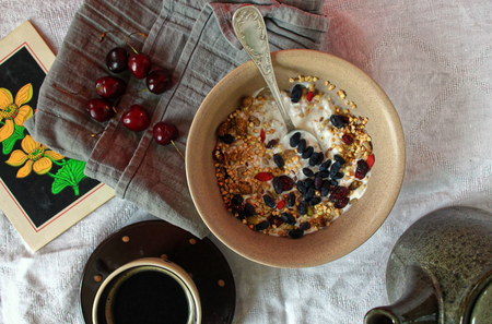 Healthy breakfast with coffee and granola and pearsの写真素材