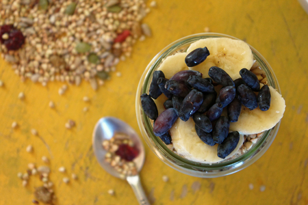 Granola with bananas and honeysuckleの写真素材