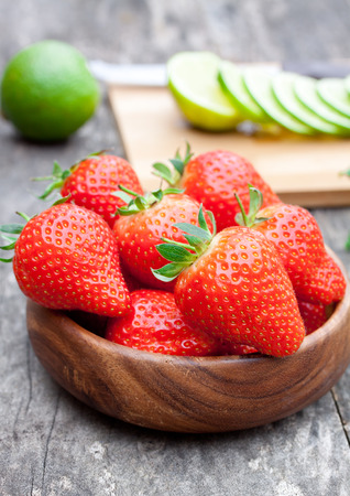 fresh strawberry and lime on the tableの写真素材