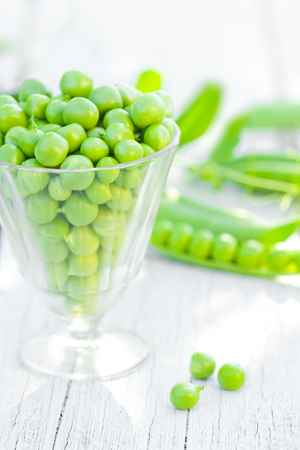 raw peas in the wine glassの写真素材