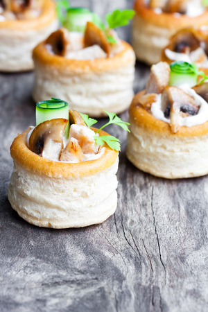 vol-au-vents  puff pastry cases filled with mushrooms and chicken breastの写真素材
