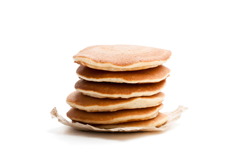 Stack of pancakes isolated on whiteの写真素材