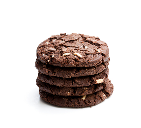 stack  of dark chocolate cookies isolated on white background の写真素材
