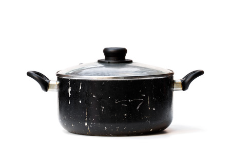 Black  used pot isolated on white の写真素材