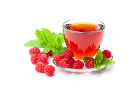 Red  fruit tea with raspberry and mint isolated on white background の写真素材