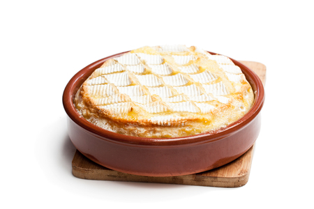 Delicious  baked camembert isolated on whiteの写真素材