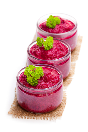 Beetroot  puree in glass jars isolated on whiteの写真素材
