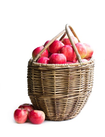 Garden  Trading Harvest Basket with Rope Handles full of fresh apples isolated on whiteの写真素材