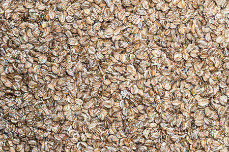 Seamless  pattern of organic rye flakes