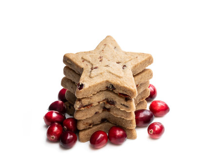 Christmas  cookies with cranberry isolated on white backgroundの写真素材