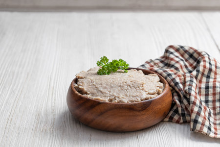 Jewish  traditional snack forshmak in wooden bowl