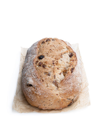 Homemade  spiced fruit bloomer loaf isolated on white