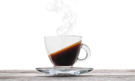 Cup of  coffee illustrating weird liquid level an effect of the fundamental forces interactionの写真素材