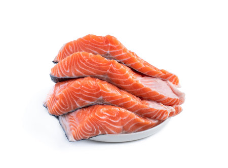 Fresh  salmon steak slices isolated on white