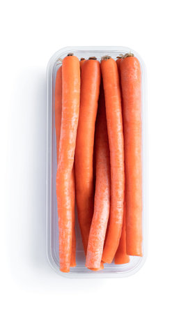 Sweet and crunchy imperator carrots in plastic container isolated on white
