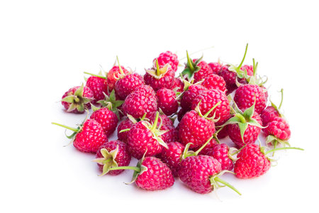 Ripe raspberries isolated on white background