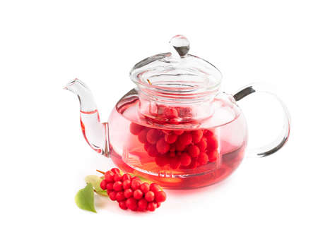 Schisandra  tea in clear glass tea pot isolated on whiteの写真素材