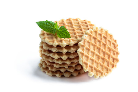 Round  Belgian waffles isolated on whiteの写真素材