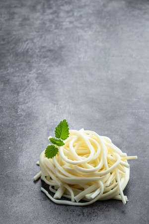 Chechil soft cheese on gray stone backgroundの写真素材