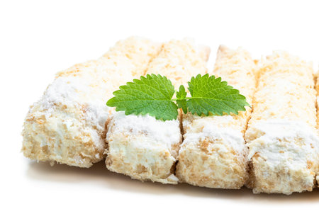 Flaky sweet rolls with cream isolated on white