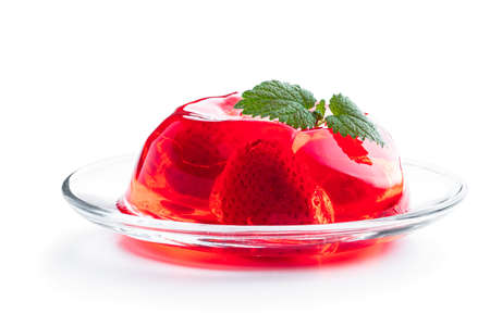 Fruit jelly with fresh strawberry isolated on whiteの写真素材