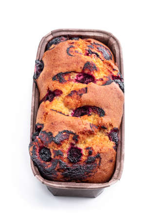Homemade freshly baked cake loaf with sweet cherry isolated on whiteの写真素材