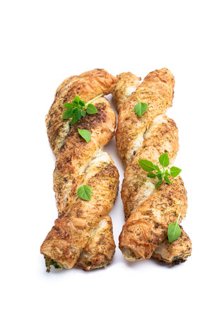 Puff pastry braid stuffed with minced meat isolated on whiteの写真素材