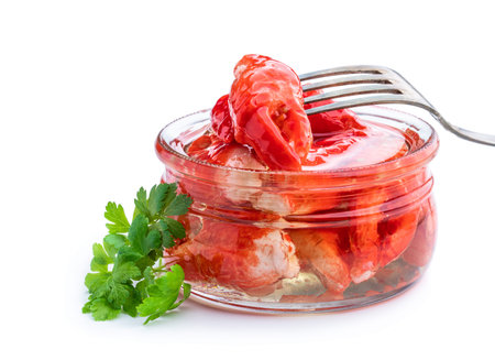 Imitation crab meat in glass jar isolated on whiteの写真素材