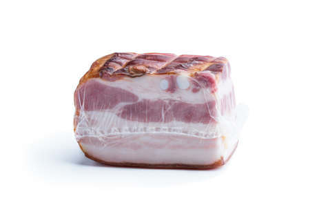 Smoked and boiled bacon in vacuum pack isolated on whiteの写真素材