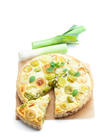 Quiche with leek and cheese isolated on whiteの写真素材