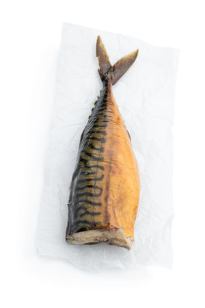 Hot smoked mackerelfish on plate isolated on a white backgroundの写真素材