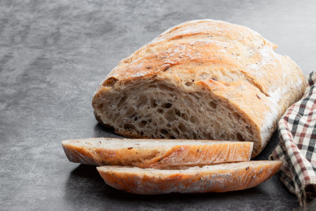 Sliced Sourdough Bread isolated on gray backgroundの写真素材