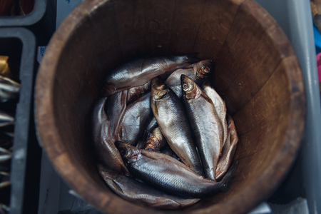 Herring in a wooden barrel - sea fish.の写真素材