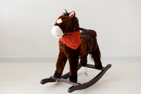 Cute vintage classic rocking horse chair children could enjoy the riding on white backgroundの写真素材