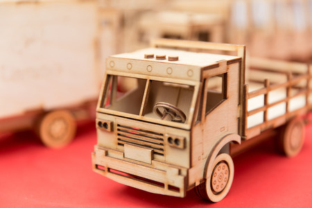 miniature wooden mechanical truck on the tablの写真素材