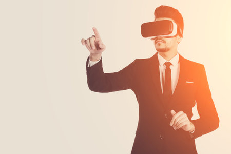 3d vision technology, virtual reality glasses. Male person in suit and digital vr device with...