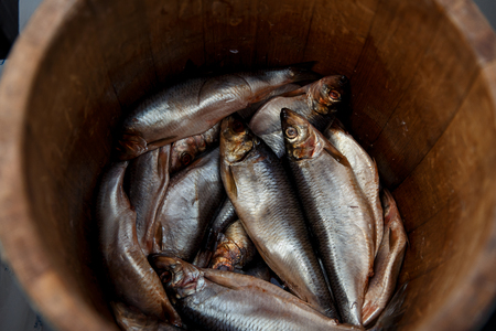 Fresh fishes on basket for sale in a beach market.の写真素材