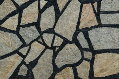 Aged stone, old bricks texture, rocky wall surface closeup. Grunge rock, bathroom or kitchen tile