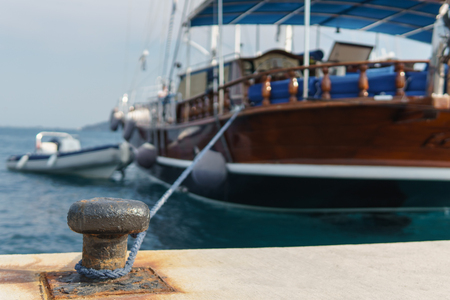 Moored yacht on the pier. Side view.の写真素材