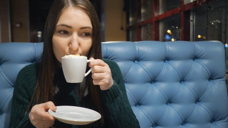 close up of beautiful Woman Drinking Coffee, copy space