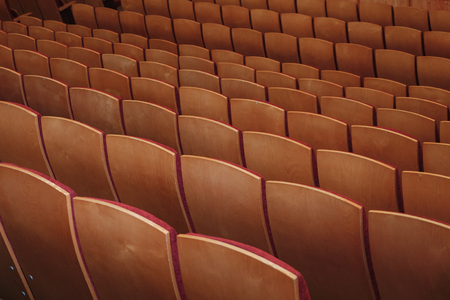 Red seats in a empty theater and opera, back viewの写真素材