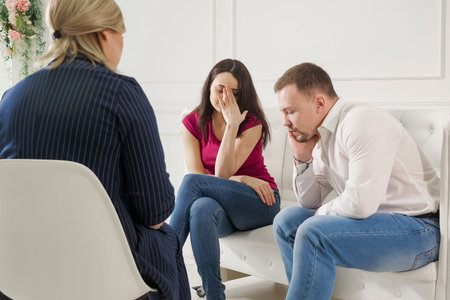 Young couple at a reception with a psychologist.