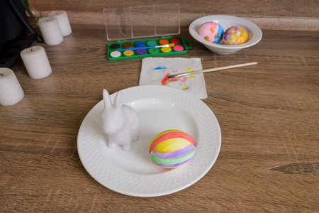 Topdown View Of Bunny And Egg With Colorful Striped Egg, Watercolor Palette, Decorated Bowl,...