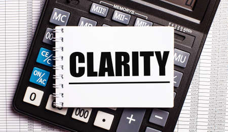 CLARITY word written on a white card on a calculatorの写真素材