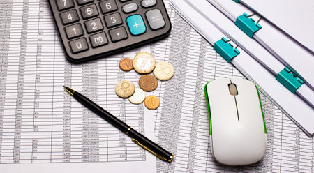 On the desktop there are reports, calculator, cash, pen and notepad. Business concept. Flat layの写真素材